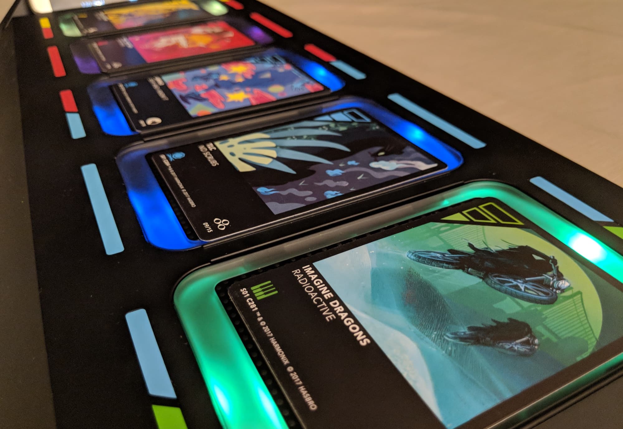 Illuminated DropMix board showing colorful LED lighting