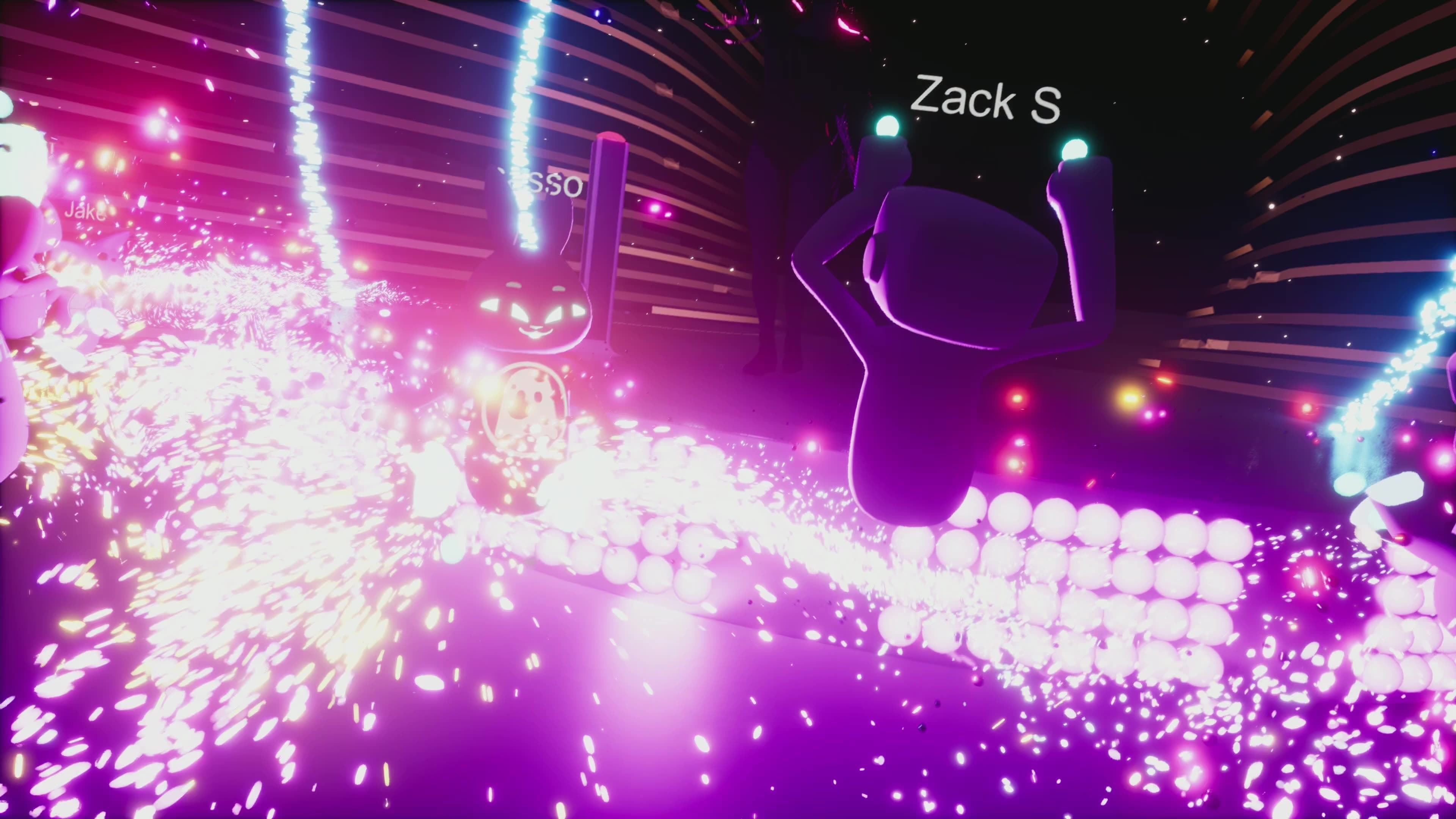 Silhouetted performer amid explosive pink particle effects