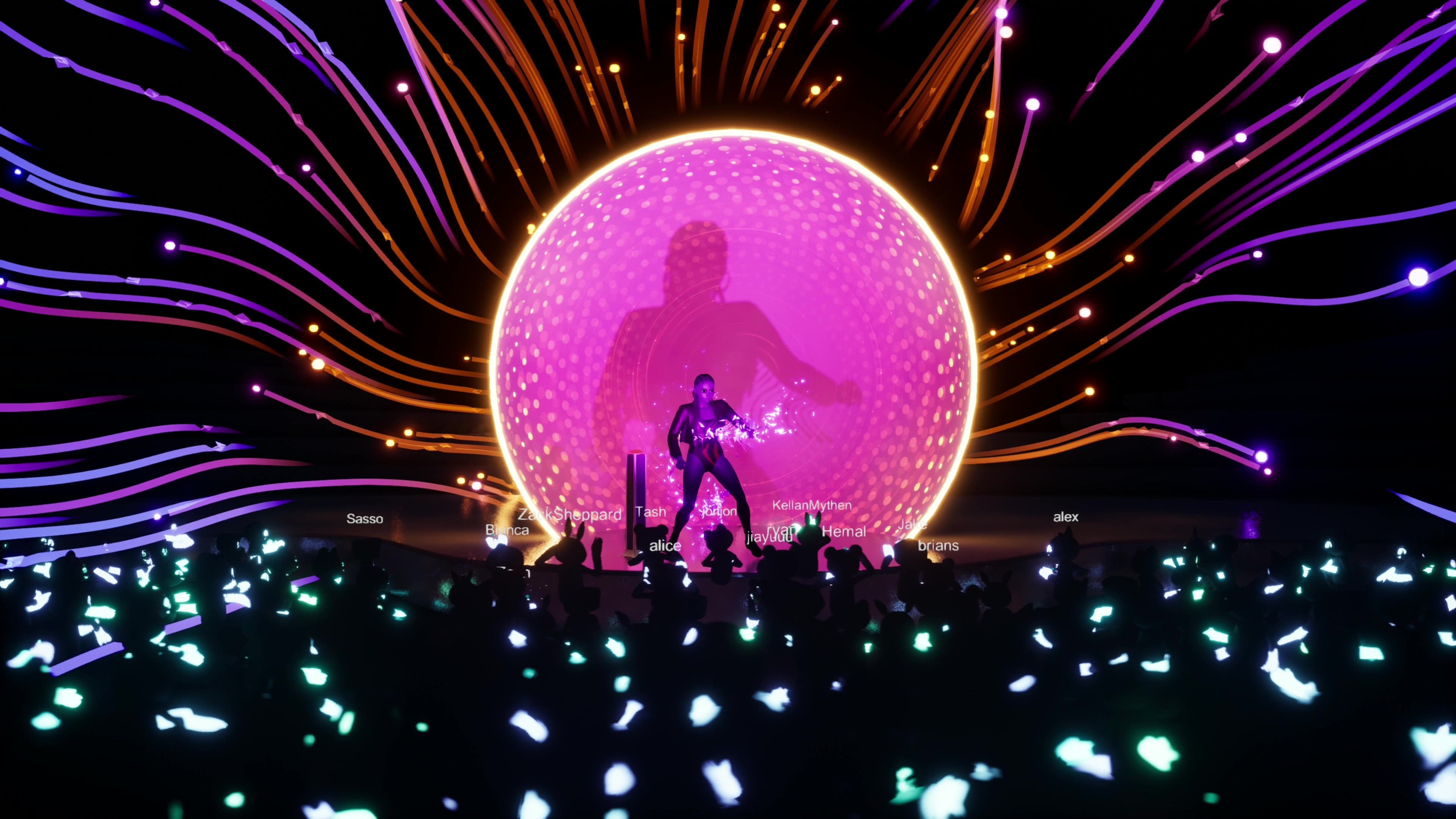 Performer inside massive glowing pink sphere