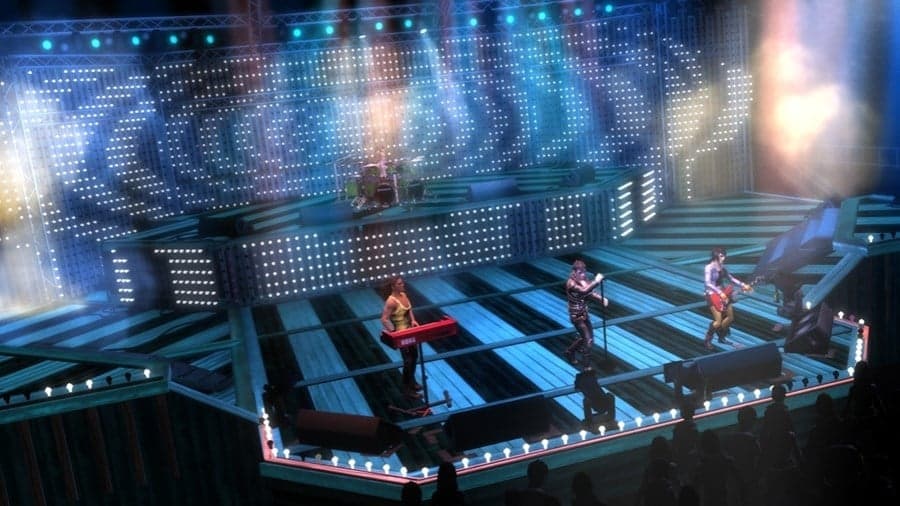 Band performing on futuristic illuminated stage